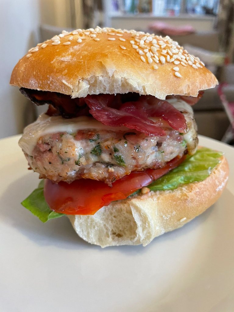 Picture of a chicken and R
rice burger in a bread roll for illustration purposes